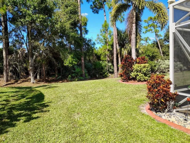 a view of swimming pool with a garden