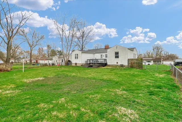 a view of a house with a big yard
