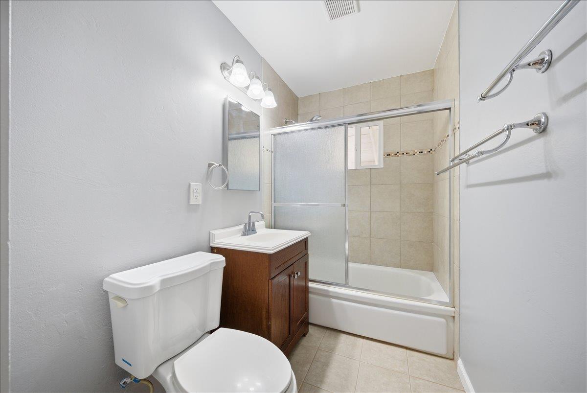 2509 Ganzan Way Rancho Cordova, CA 95670 - Photo 17 of 33 a white toilet sitting next to a bath tub