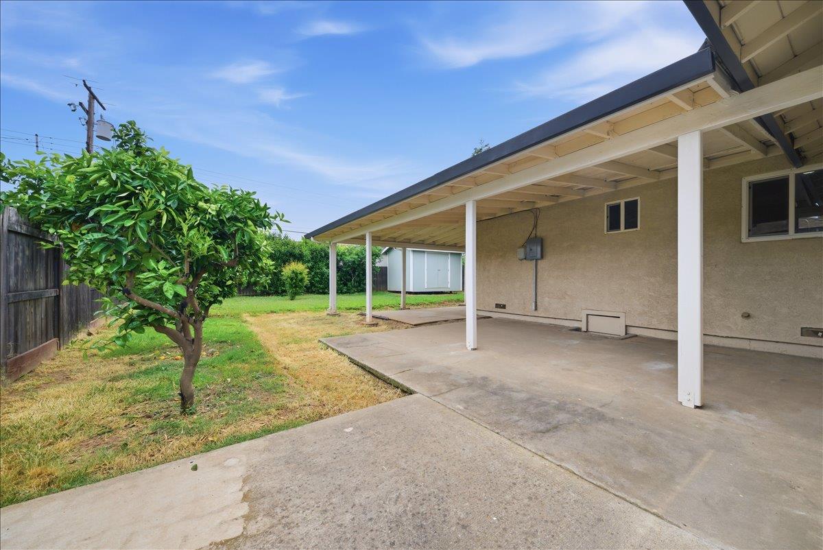 2509 Ganzan Way Rancho Cordova, CA 95670 - Photo 19 of 33 a view of a house with a yard and potted plants