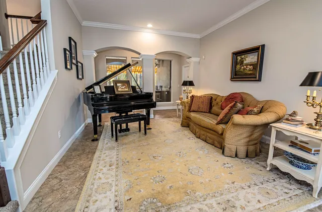 a dining table with chairs and couches