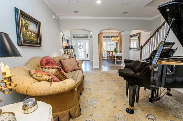 a bathroom with a toilet a sink and a mirror