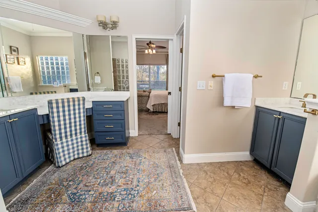 a bedroom with a bed and a desk