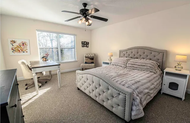 a bathroom with a sink toilet and mirror