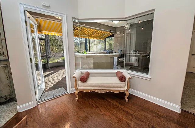 a room with gym equipment and a table