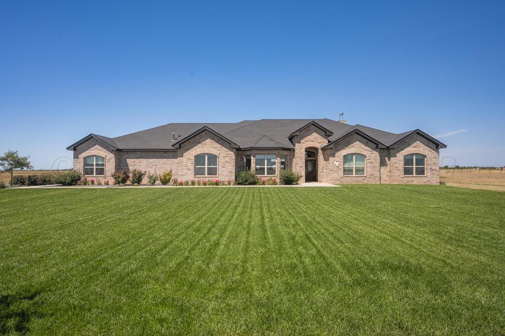 10855 Travis Lane Dumas, TX 79029 - Photo 2 of 40 front 1