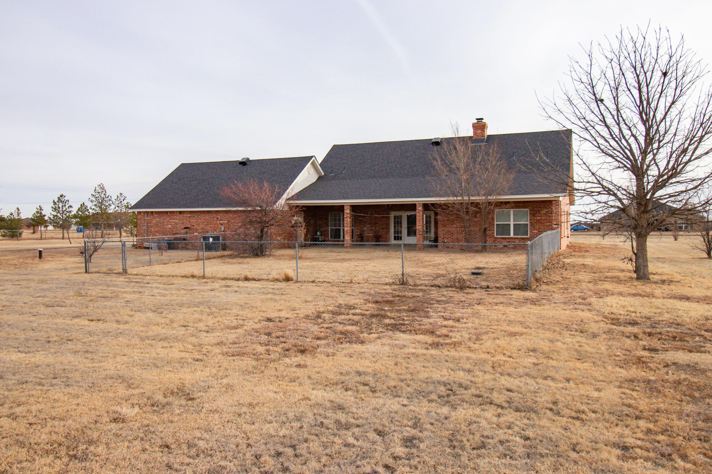 15212 Halsey Trail Amarillo, TX 79118 - Photo 45 of 47 a front view of a house with a yard