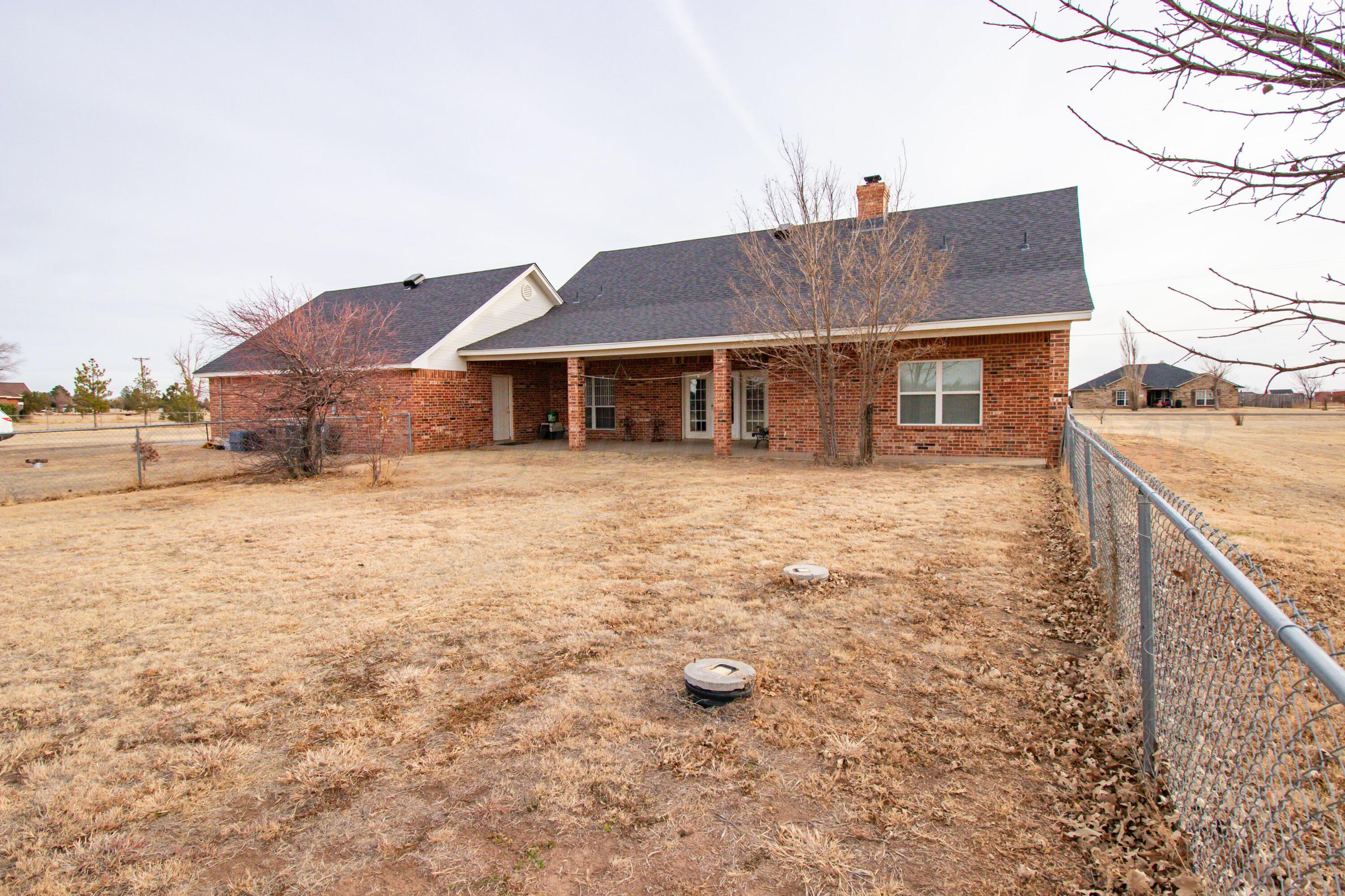 15212 Halsey Trail Amarillo, TX 79118 - Photo 46 of 47 a view of a house with a yard