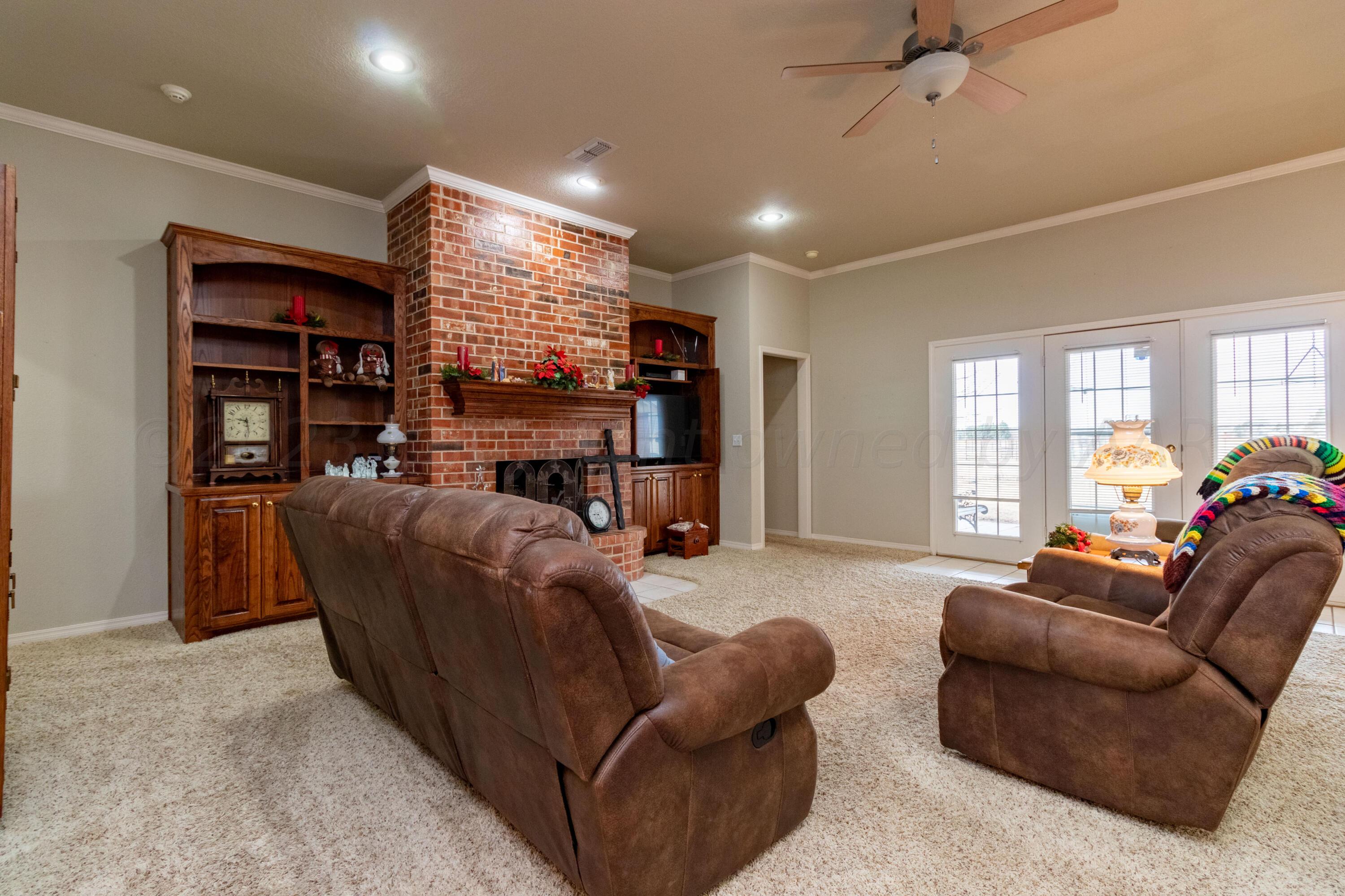 15212 Halsey Trail Amarillo, TX 79118 - Photo 8 of 47 a living room with furniture and a large window