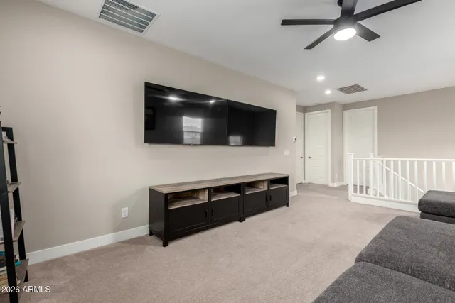 a bedroom with furniture and window