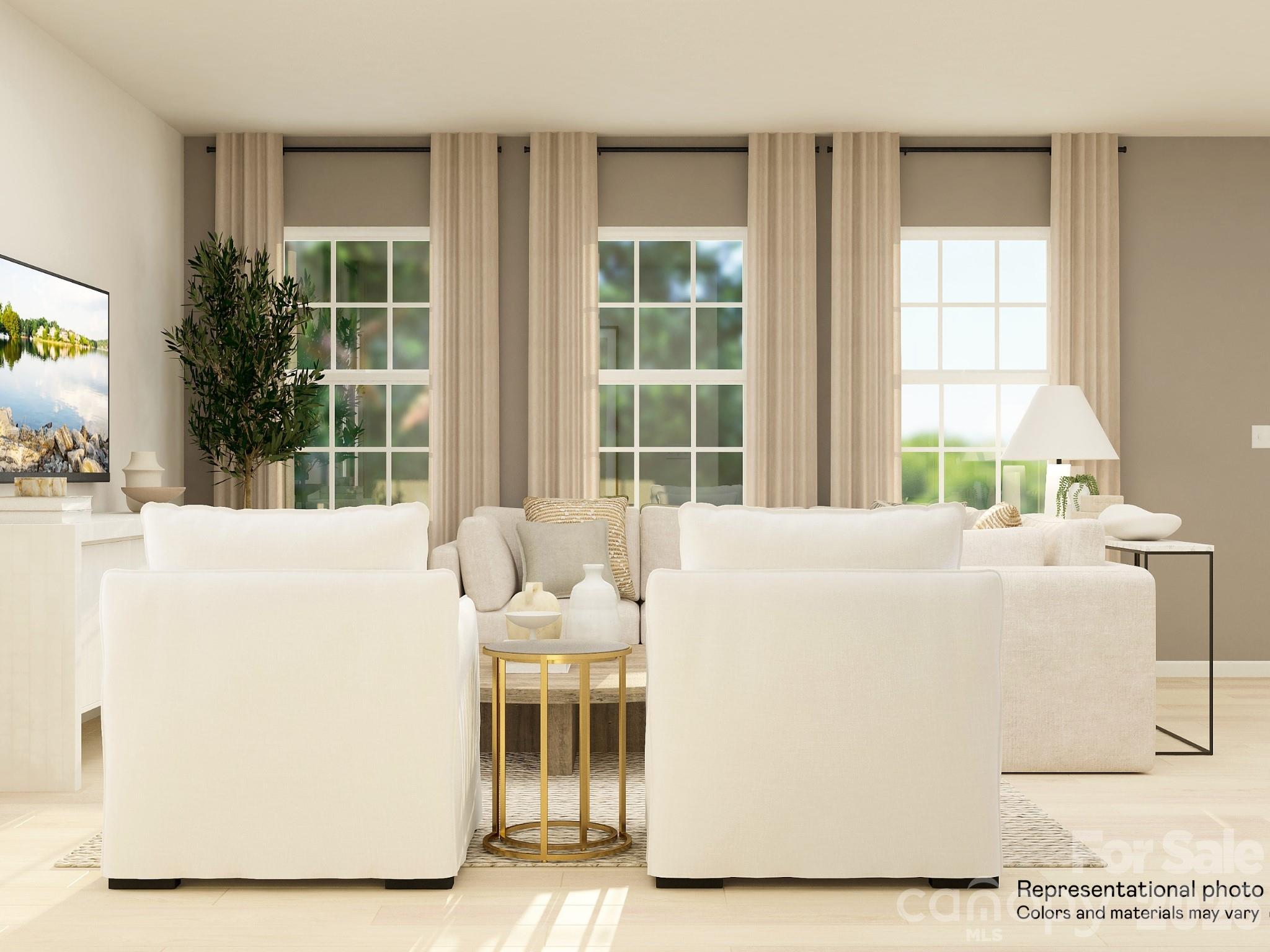7032 Juneberry Way Maiden, NC 28650 - Photo 14 of 25 a living room with a table and windows