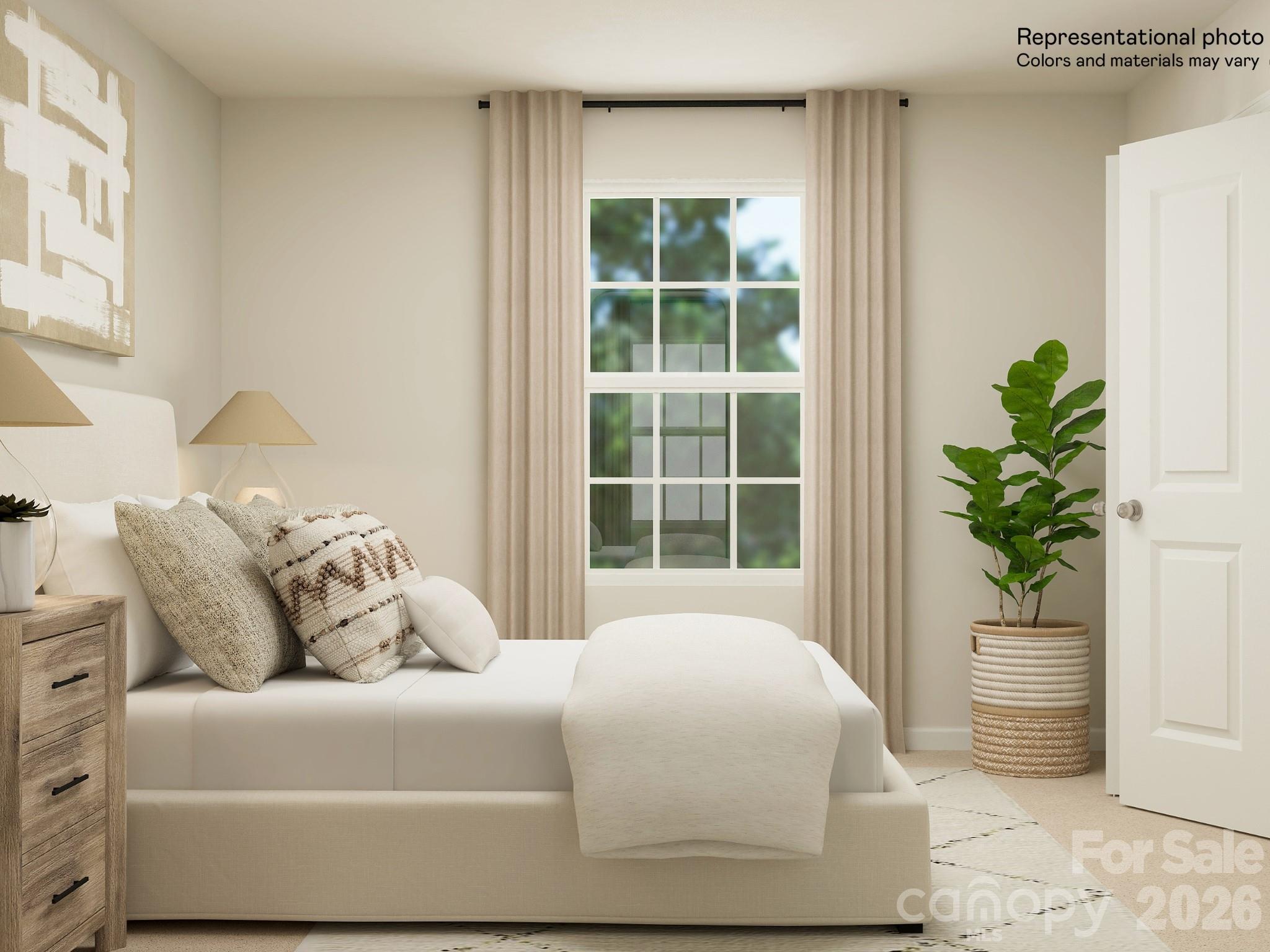 7032 Juneberry Way Maiden, NC 28650 - Photo 6 of 25 a bedroom with a bed and a potted plant