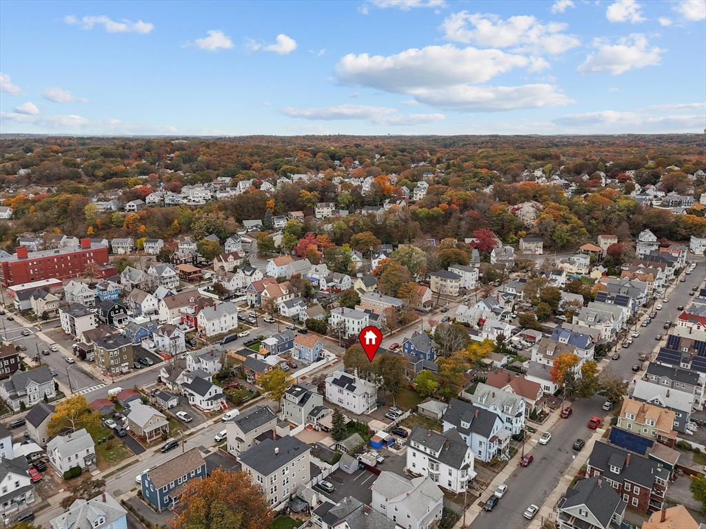 75 Grove Street Lynn, MA 01905 - Photo 35 of 38 an aerial view of residential building with green space