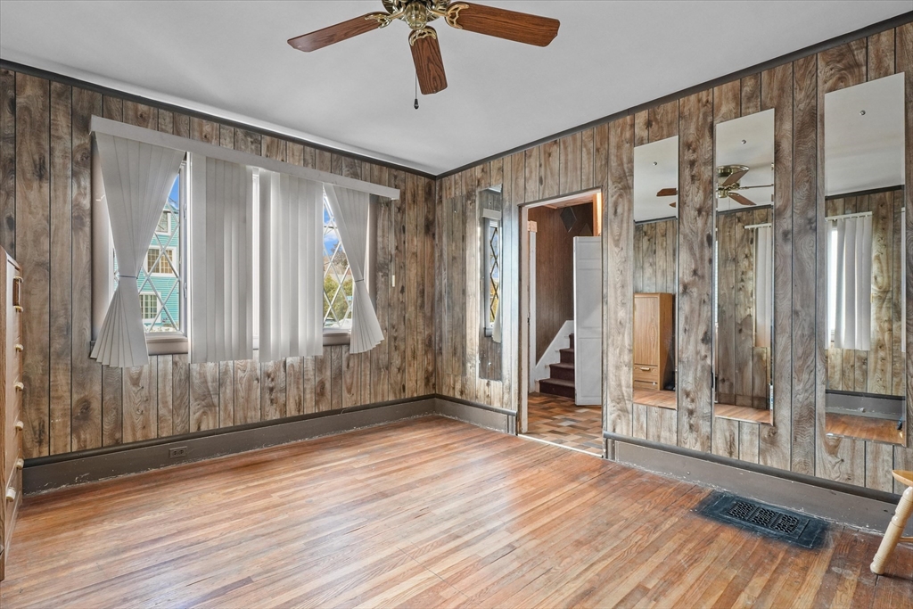 75 Grove Street Lynn, MA 01905 - Photo 5 of 38 a view of livingroom with hardwood floor and window