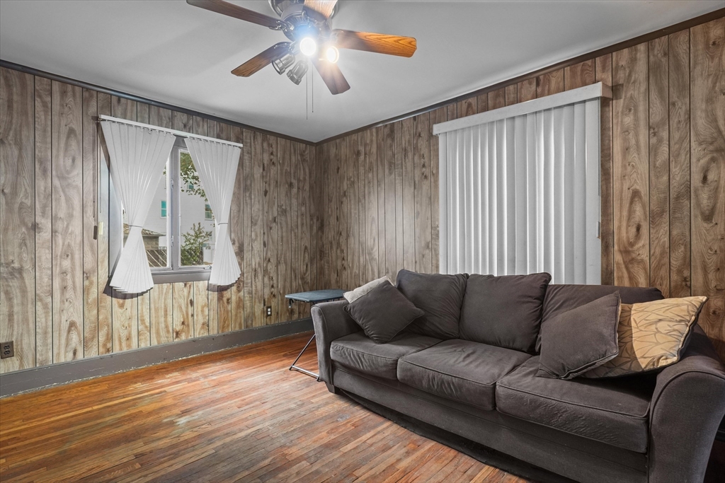 75 Grove Street Lynn, MA 01905 - Photo 6 of 38 a living room with furniture and a large window