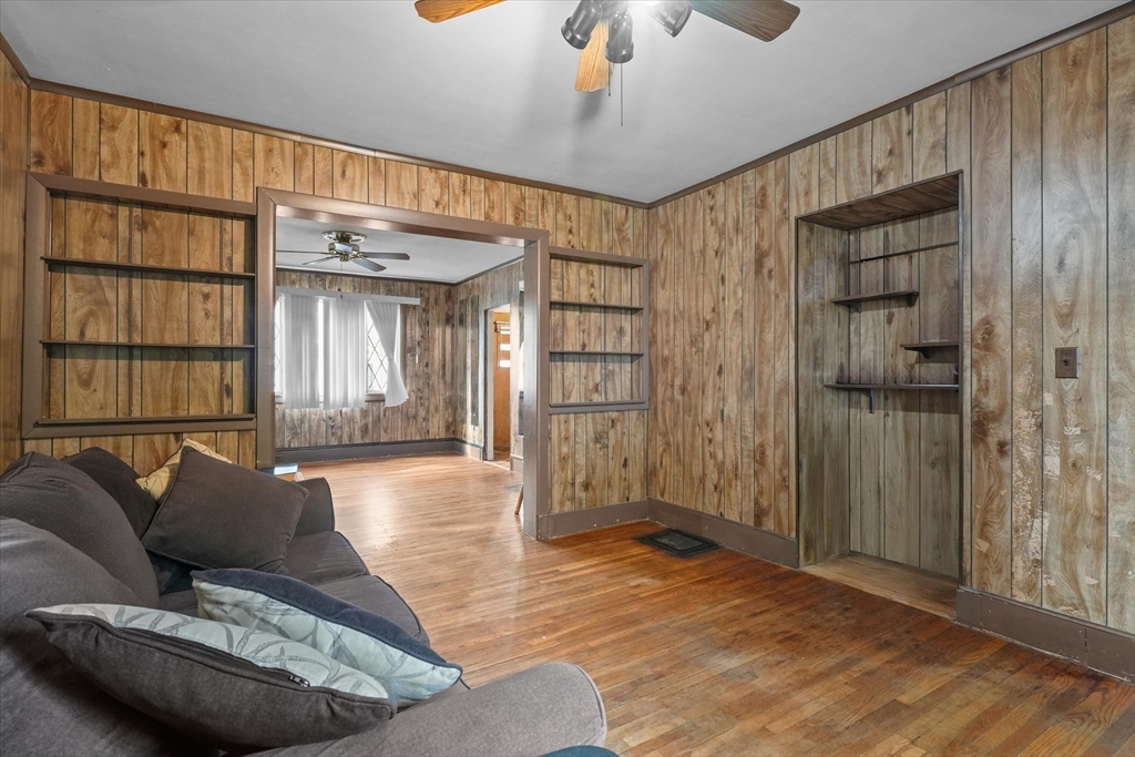 75 Grove Street Lynn, MA 01905 - Photo 7 of 38 a living room with furniture and a window