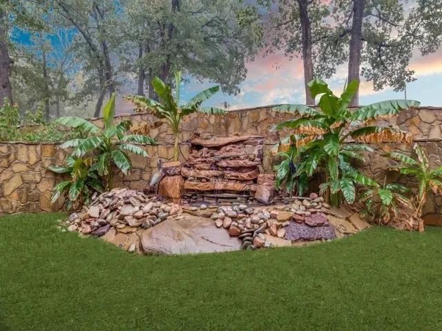 a view of a garden with a bench