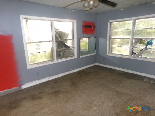 218 Cheeves Avenue Port Lavaca, TX 77979 - Photo 14 of 25 an empty room with a window