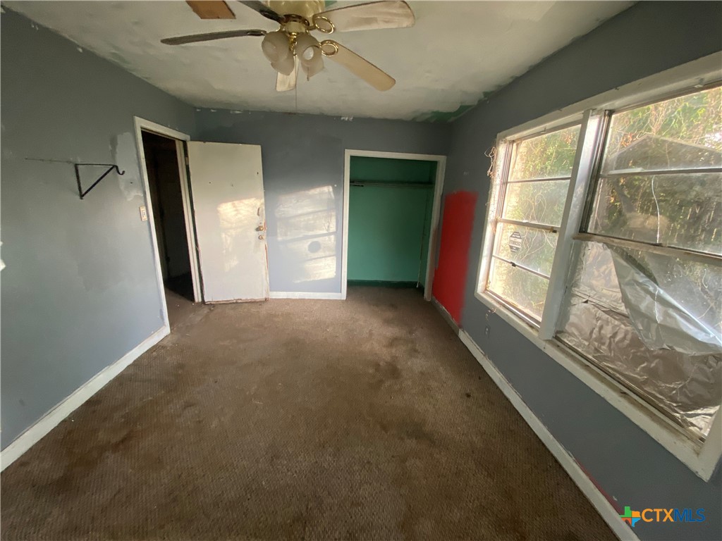 218 Cheeves Avenue Port Lavaca, TX 77979 - Photo 24 of 25 a view of an empty room with a window