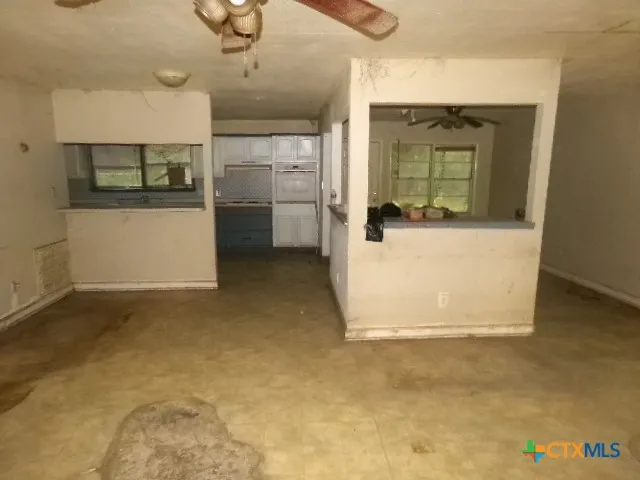 an empty room with windows