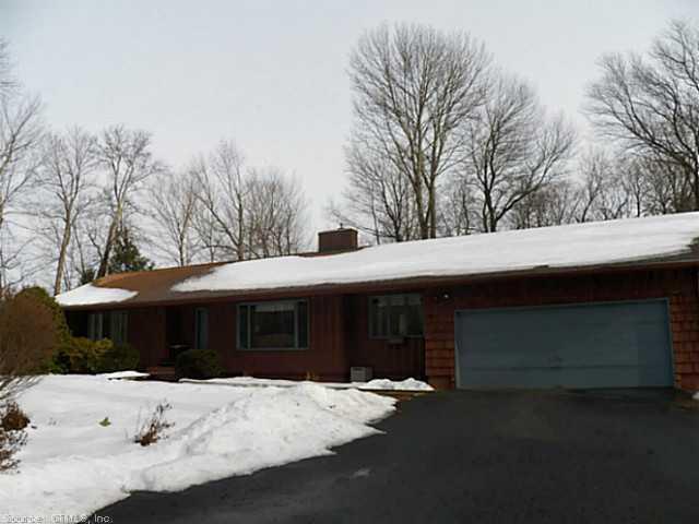 17 Scoville Road Canton, CT 06019 - Photo 1 of 1 a view of a house with a yard and garage