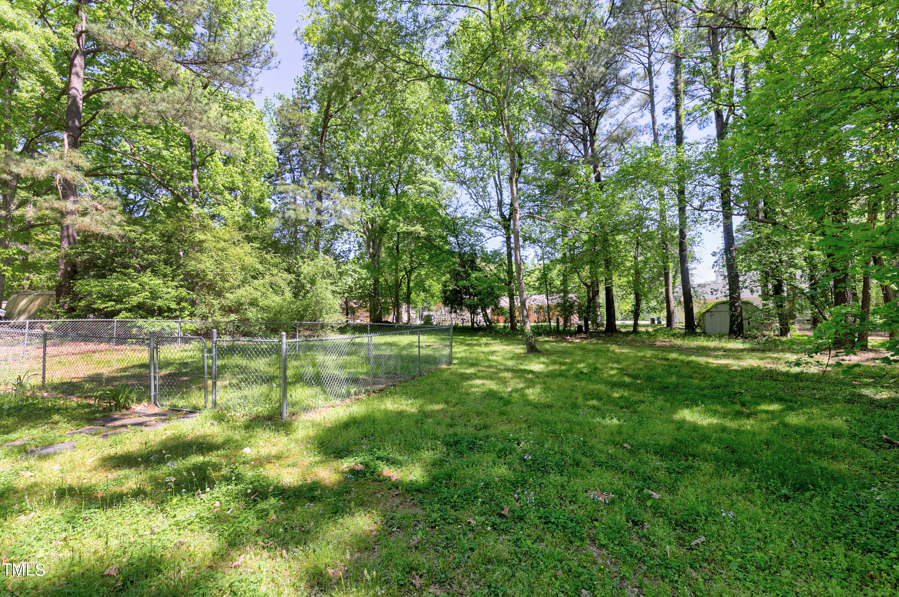 5841 Sandstone Drive Durham, NC 27713 - Photo 7 of 35 a view of green field with trees