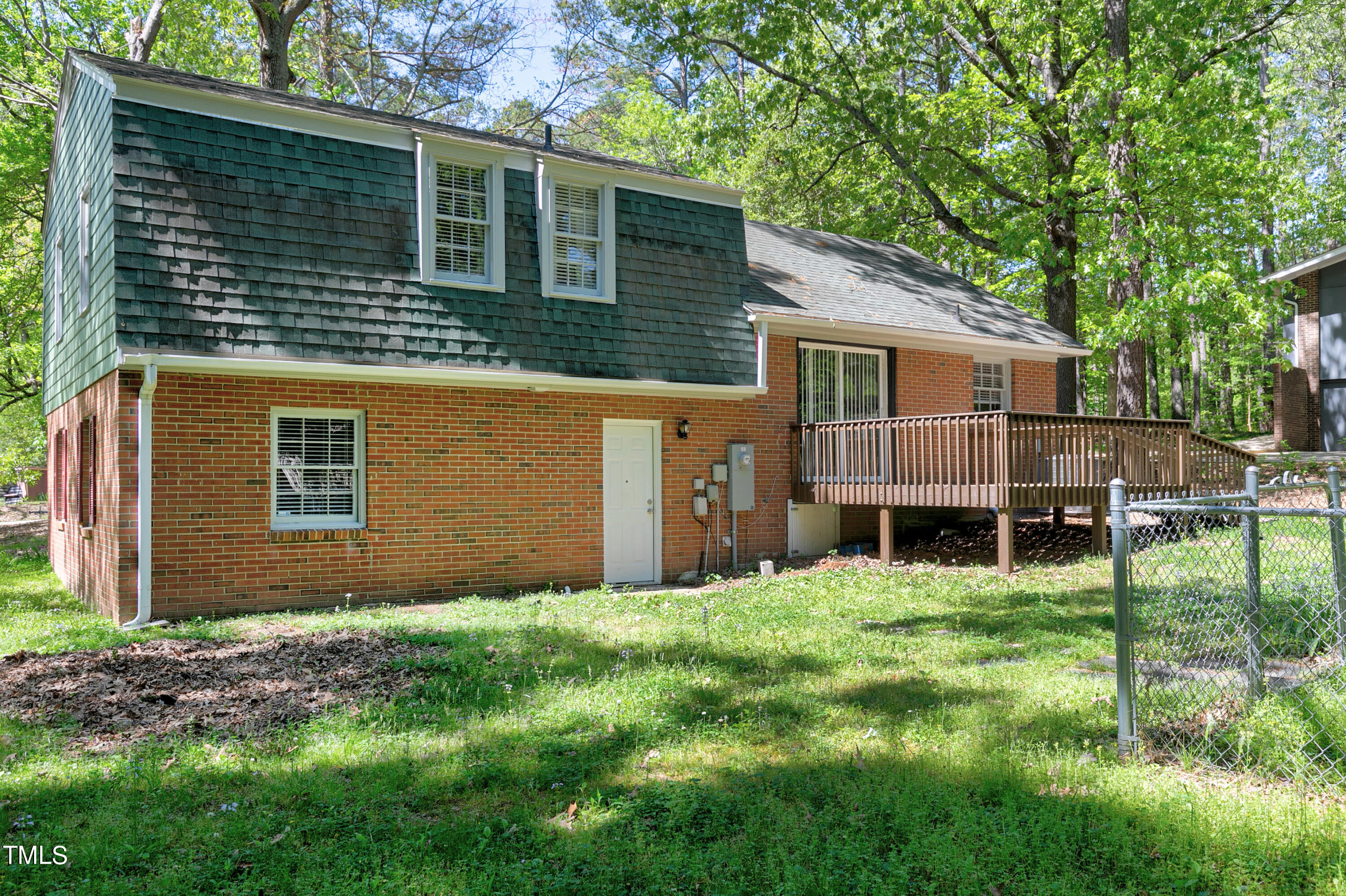 5841 Sandstone Drive Durham, NC 27713 - Photo 8 of 35 a view of a house with a yard