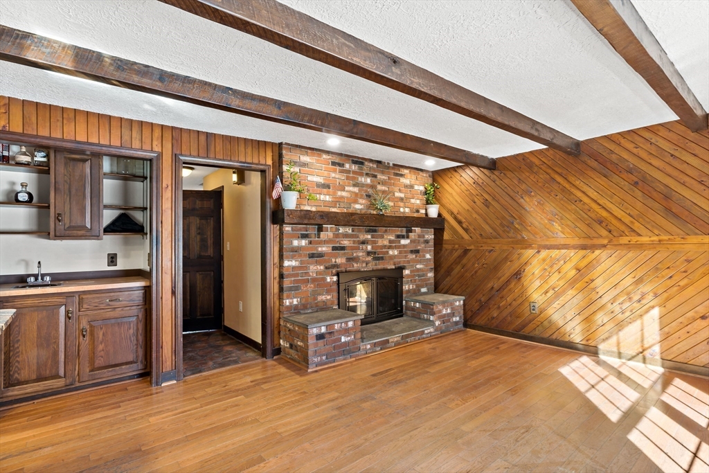 15 Hickory Ridge Road Rehoboth, MA 02769 - Photo 12 of 42 a view of an empty room with kitchen and a window