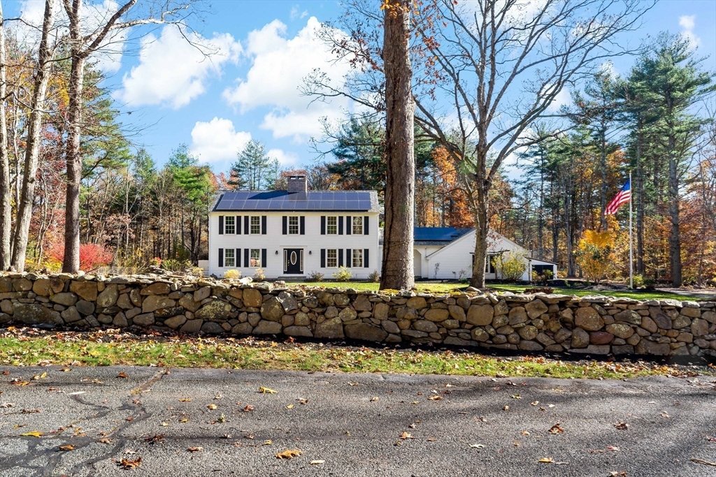 15 Hickory Ridge Road Rehoboth, MA 02769 - Photo 3 of 42 a street view with large trees