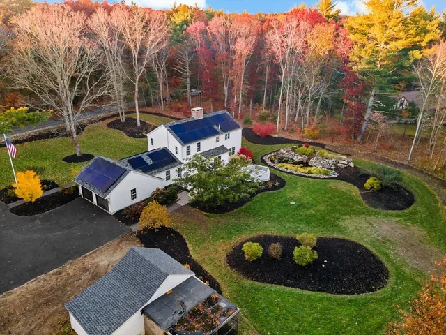 a view of a swimming pool with a yard