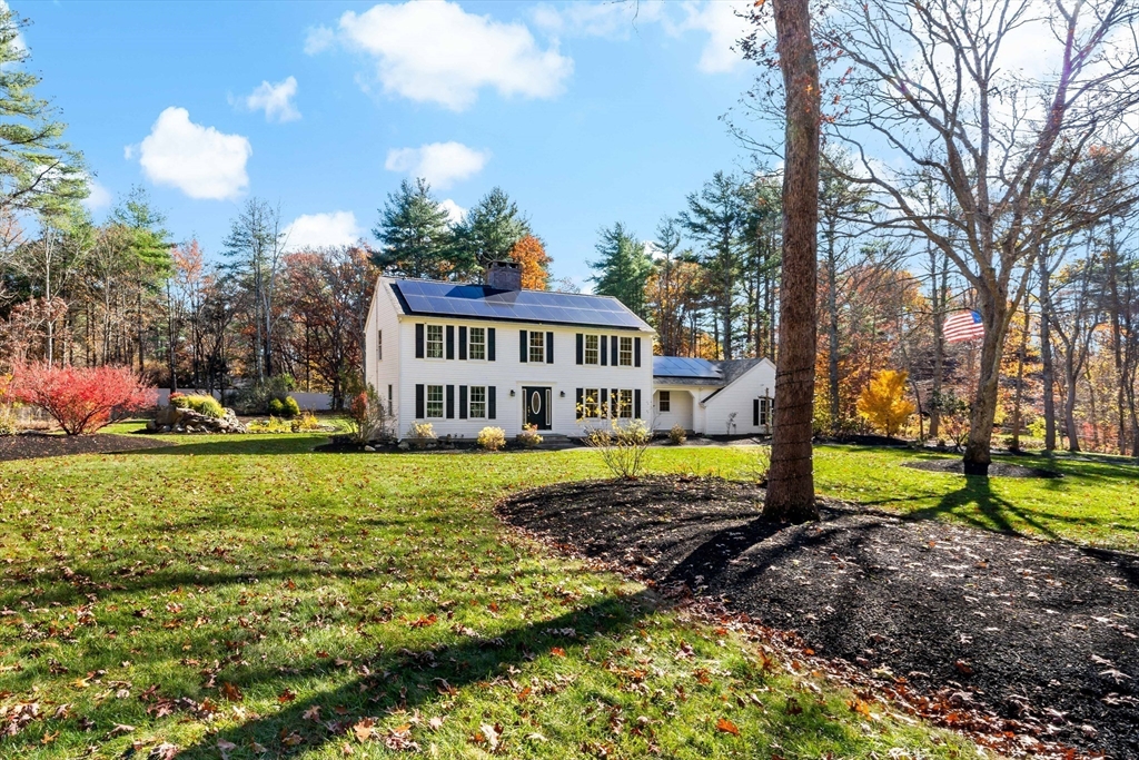 15 Hickory Ridge Road Rehoboth, MA 02769 - Photo 41 of 42 a view of a house with a yard and sitting area