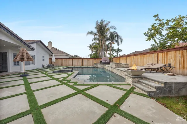 a view of a house with swimming pool