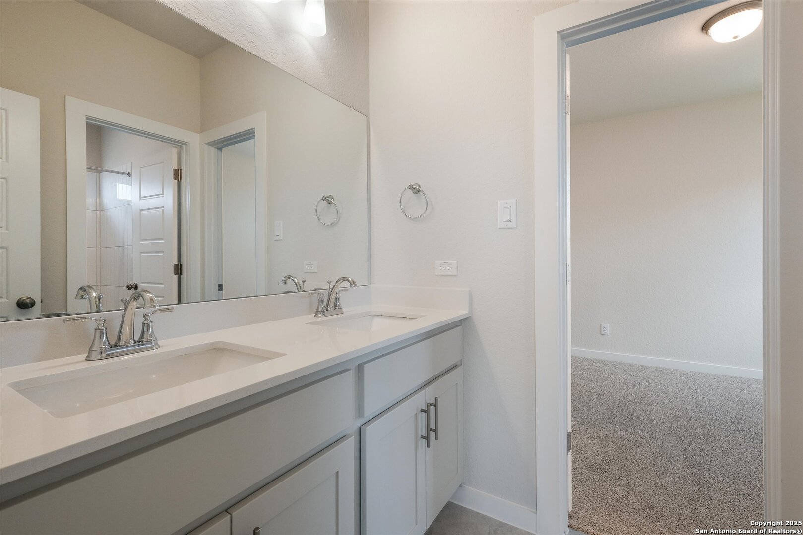 444 Foxbrook Way Cibolo, TX 78108 - Photo 19 of 32 a bathroom with a sink and a mirror