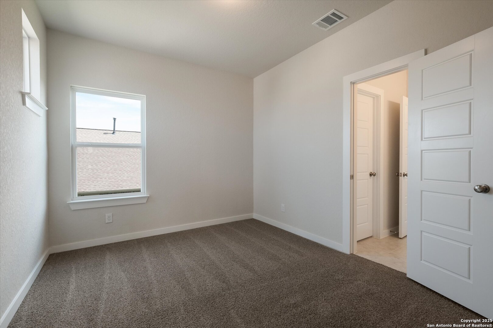 444 Foxbrook Way Cibolo, TX 78108 - Photo 20 of 32 an empty room with windows