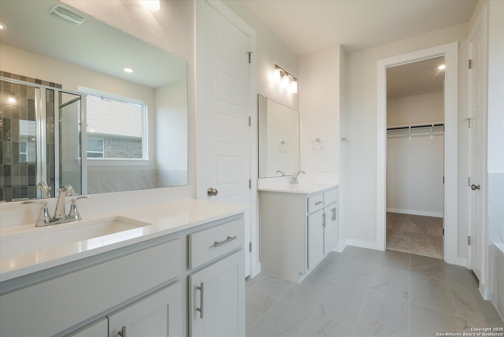 444 Foxbrook Way Cibolo, TX 78108 - Photo 9 of 17 a bathroom with a double vanity sink mirror and double