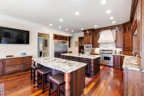 a bathroom with a sink a mirror and a toilet