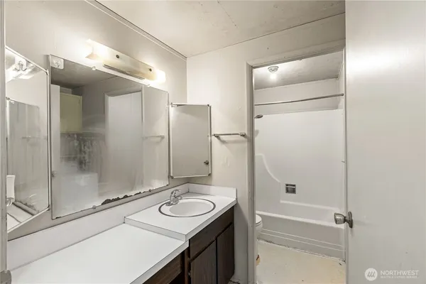 en empty room with windows