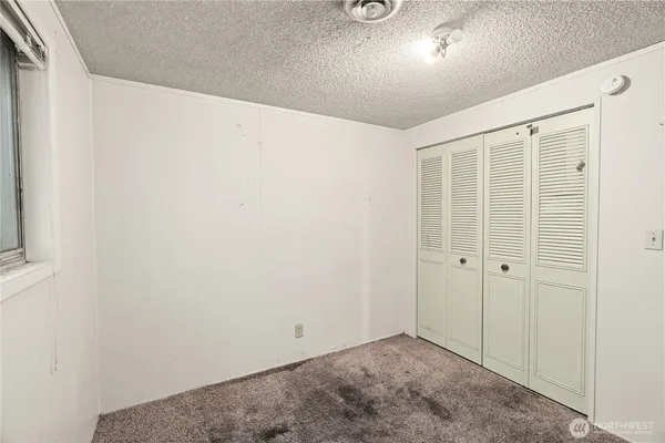 a view of a backyard of the house