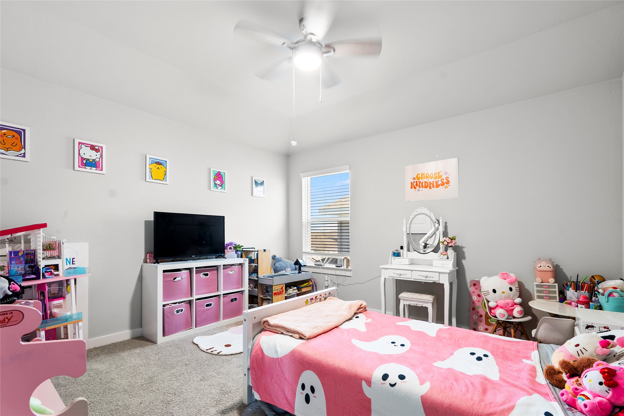 156 Appleberry Lane Elgin, TX 78621 - Photo 19 of 40 a bedroom with a bed dresser and a flat screen tv