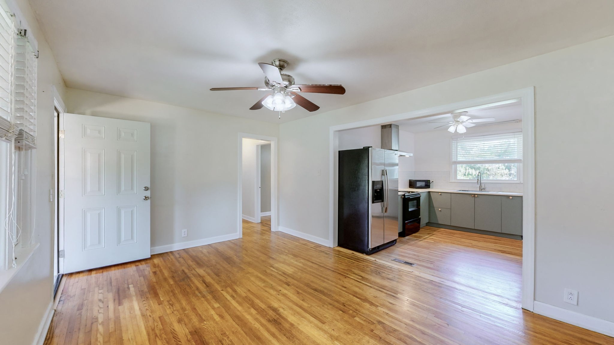 1007 Hunt Street Murfreesboro, TN 37130 - Photo 11 of 58 a view of a kitchen with wooden floor and a kitchen