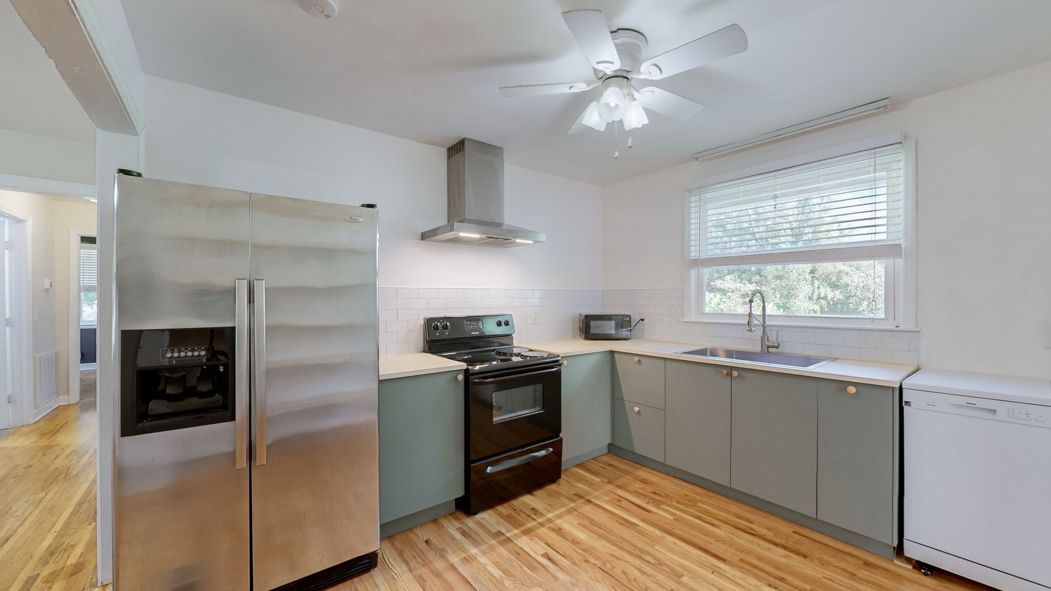 1007 Hunt Street Murfreesboro, TN 37130 - Photo 13 of 58 a kitchen with a sink stove and refrigerator