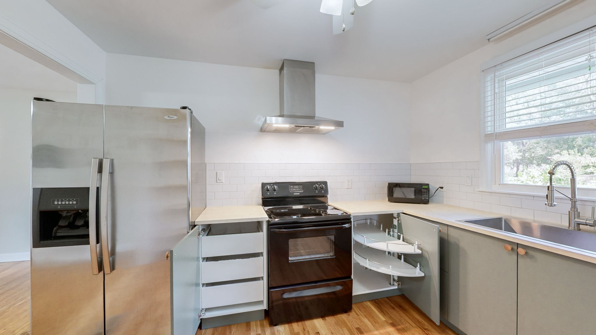 1007 Hunt Street Murfreesboro, TN 37130 - Photo 15 of 58 a kitchen with a refrigerator and a sink