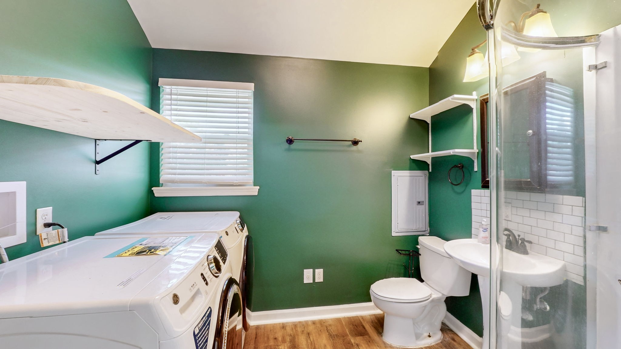 1007 Hunt Street Murfreesboro, TN 37130 - Photo 24 of 58 a bathroom with a sink a toilet and mirror