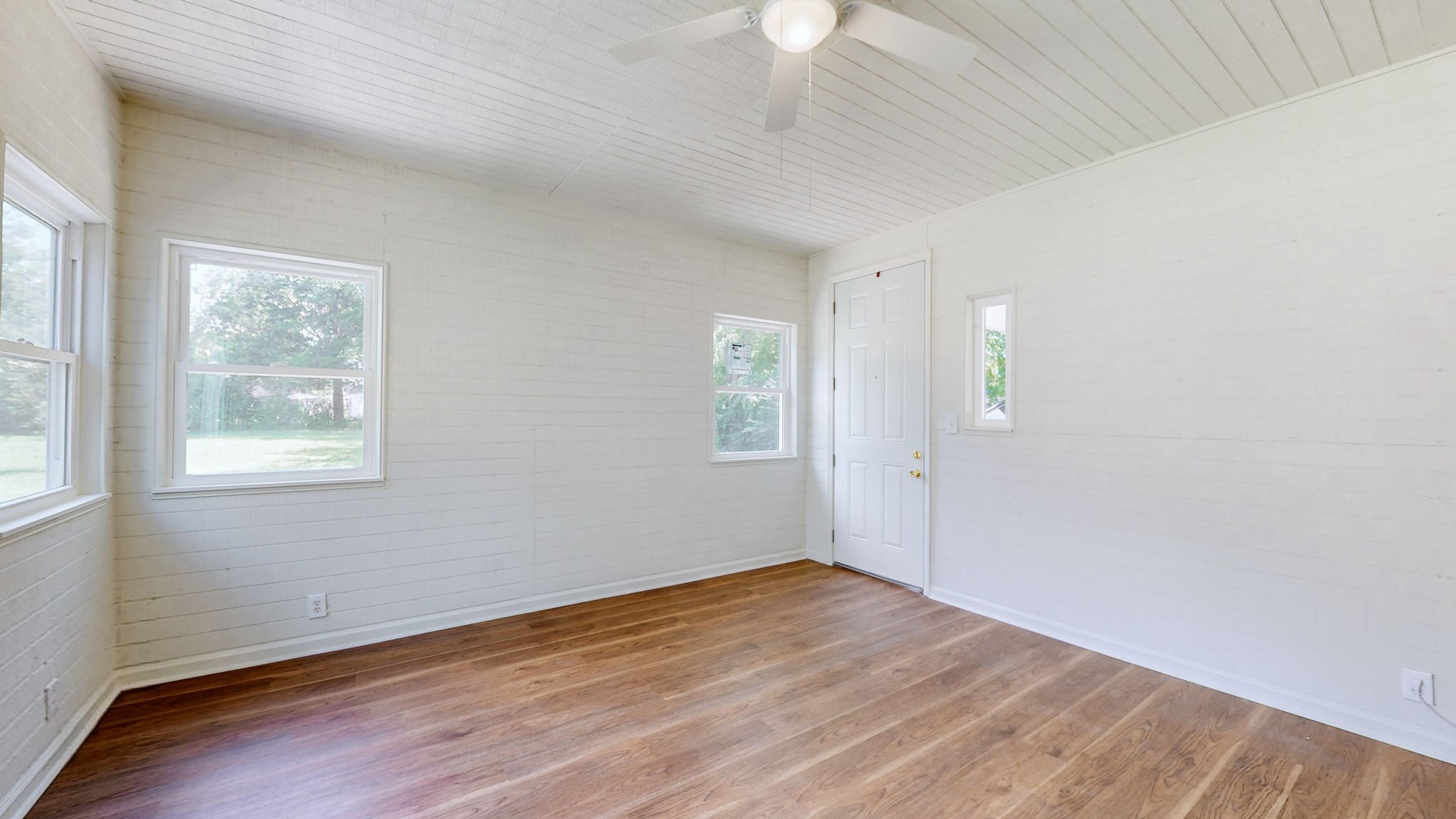 1007 Hunt Street Murfreesboro, TN 37130 - Photo 31 of 58 wooden floor in an empty room with a window