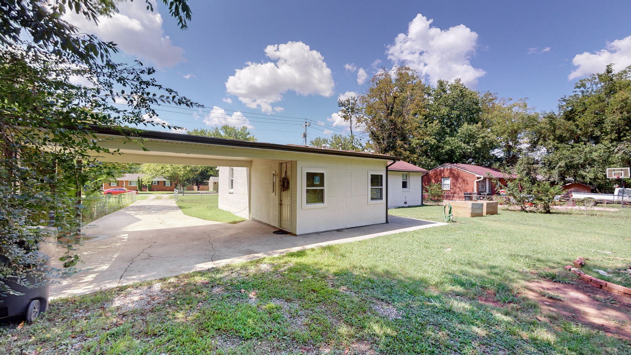 1007 Hunt Street Murfreesboro, TN 37130 - Photo 46 of 58 a view of a house with backyard and a tree