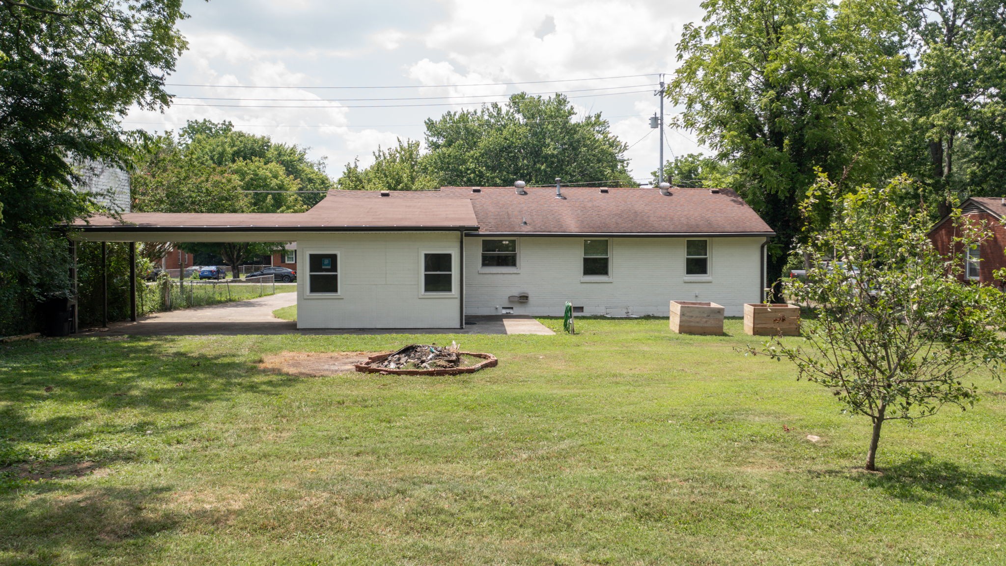 1007 Hunt Street Murfreesboro, TN 37130 - Photo 47 of 58 a view of a house with a yard
