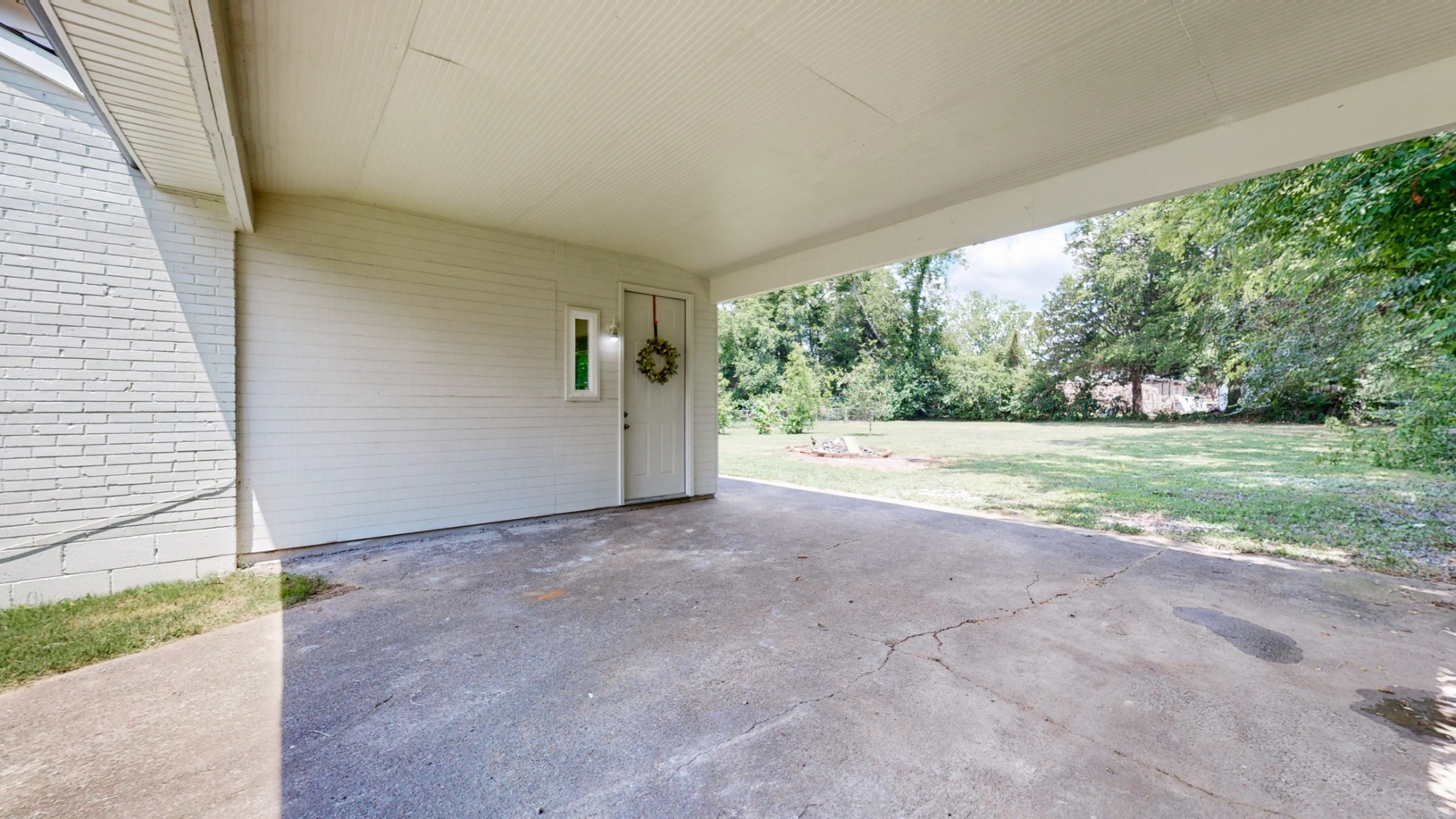 1007 Hunt Street Murfreesboro, TN 37130 - Photo 48 of 58 a view of a big room with yard and large tree