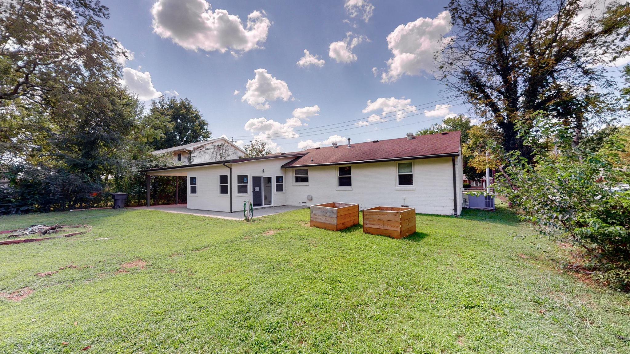 1007 Hunt Street Murfreesboro, TN 37130 - Photo 50 of 58 a view of a house with a yard