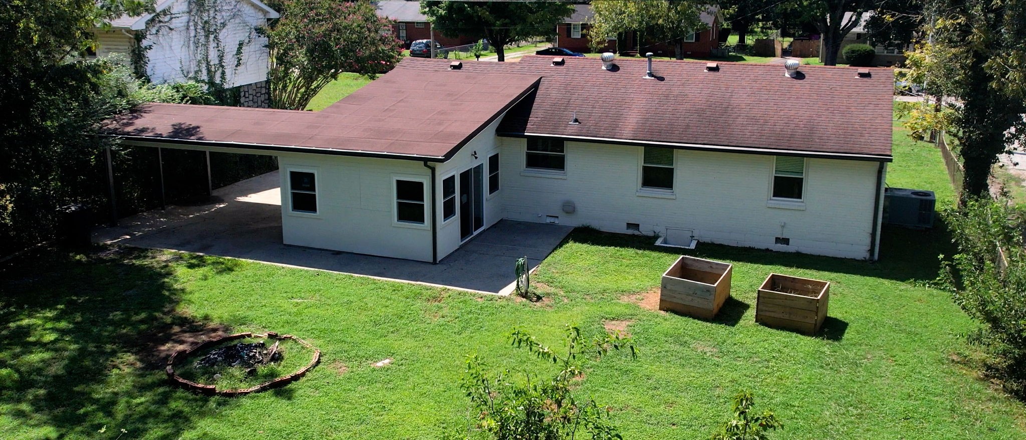 1007 Hunt Street Murfreesboro, TN 37130 - Photo 56 of 58 a aerial view of a house with swimming pool yard and outdoor seating