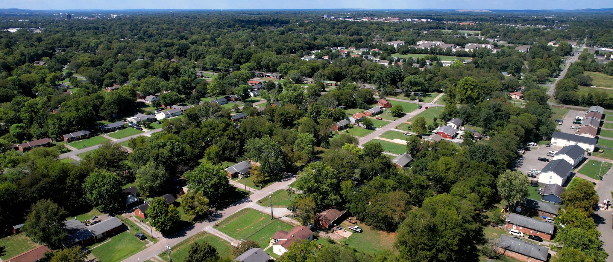1007 Hunt Street Murfreesboro, TN 37130 - Photo 57 of 58 an aerial view of residential houses with outdoor space and trees